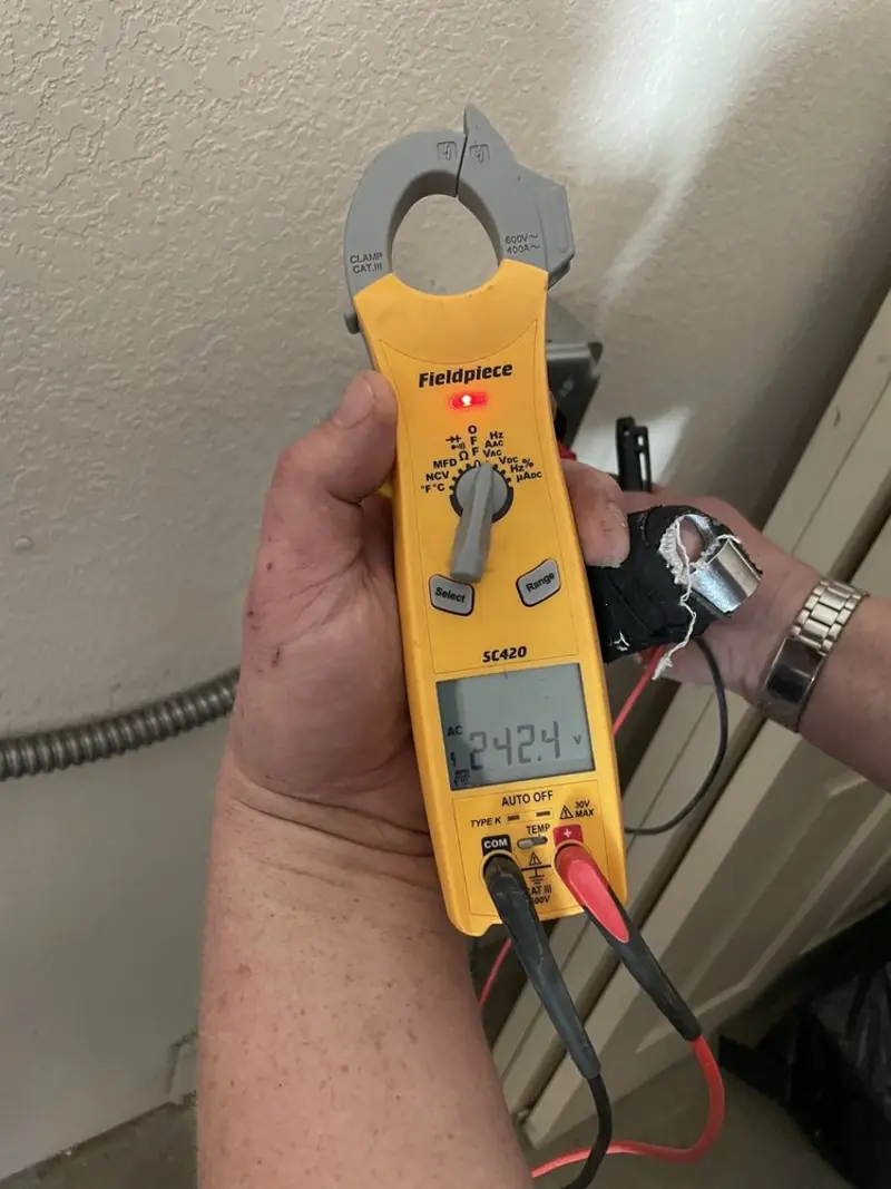 Voltage testing with clamp meter during Generator Installation in Nelsonville